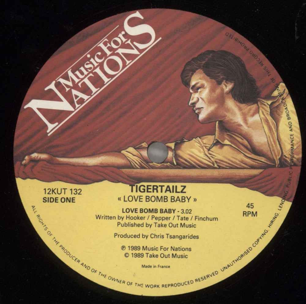 Tigertailz Love Bomb Baby UK 12" vinyl single (12 inch record / Maxi-single) TGZ12LO254269