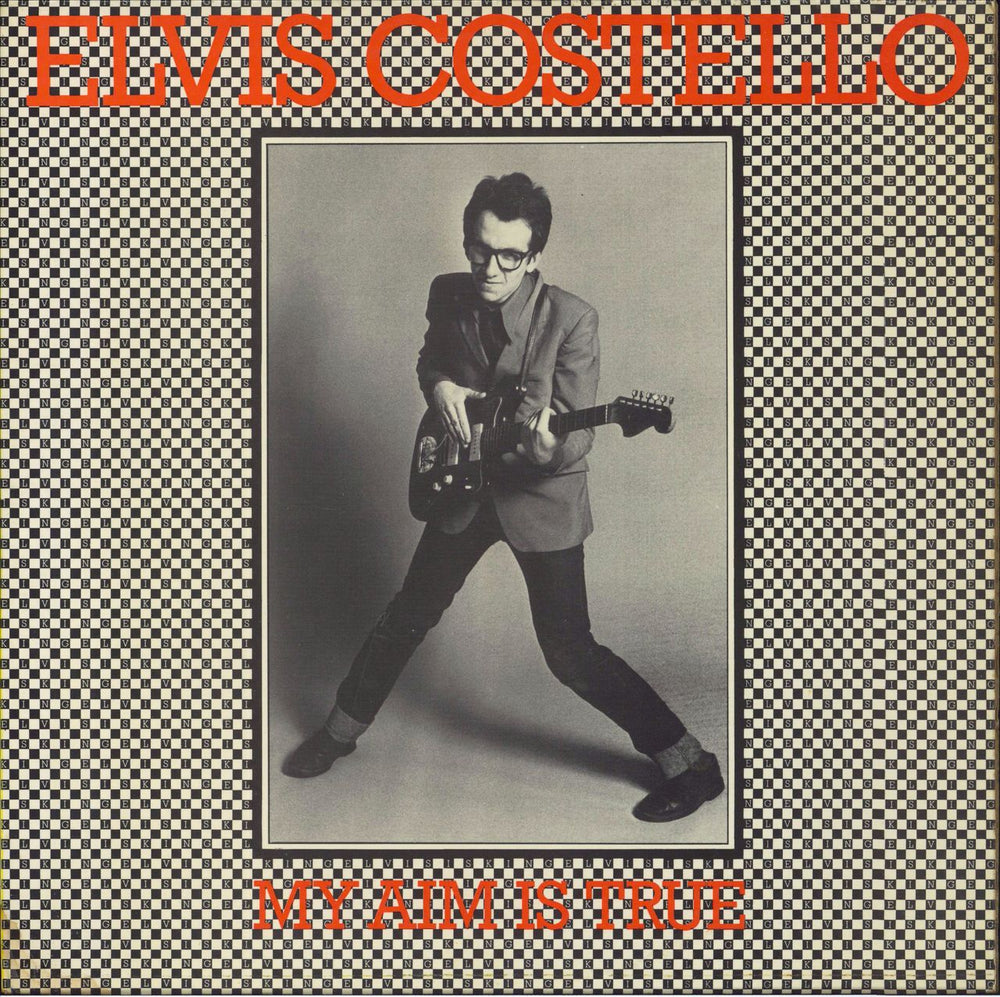 Elvis Costello My Aim Is True - Laminated - Yellow back - EX UK vinyl LP album (LP record) SEEZ3