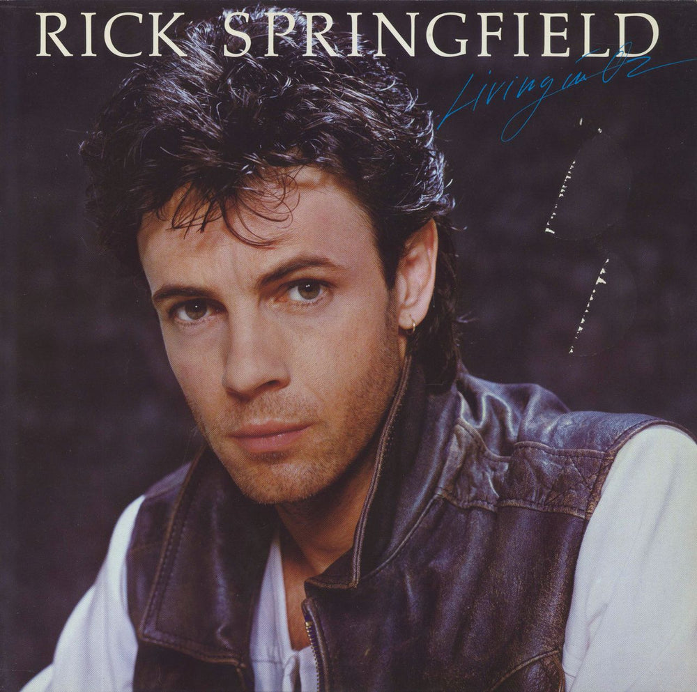 Rick Springfield Living In Oz + 12" German vinyl LP album (LP record) PL84660